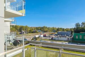 a view from the balcony of a building at Modern Apartment with Balcony by Noclegi Renters in Gdańsk +20 photos