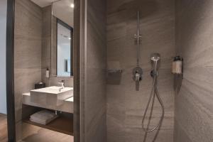 Koupelna v ubytování Grand Banyan Hotel + 25 fotografií