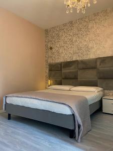 Postel nebo postele na pokoji v ubytování Casa Rosmini rooms, Dolomia best home