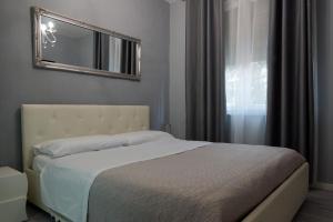 Postel nebo postele na pokoji v ubytování Casa Rosmini rooms, Dolomia best home