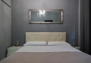 Postel nebo postele na pokoji v ubytování Casa Rosmini rooms, Dolomia best home