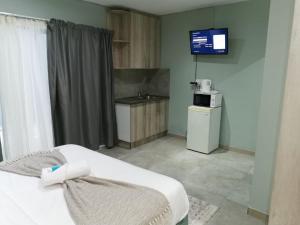 TV a/nebo společenská místnost v ubytování 18onkuruman