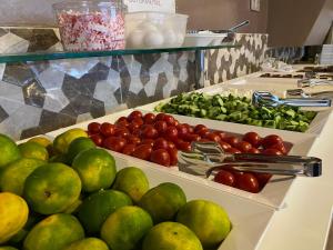a display of fruits and vegetables on display in a store at HOTEL ÖZSEFA in Istanbul