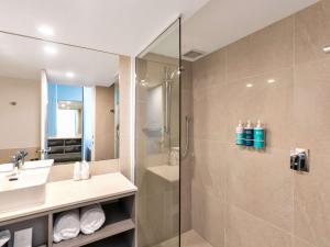 Koupelna v ubytování Novotel Cairns Oasis Resort
