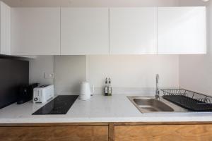 Кухня или мини-кухня в Dodo Square Residence
