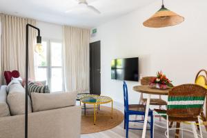 Телевизор и/или развлекательный центр в Dodo Square Residence