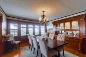 a dining room with a table and chairs at Cozy Craftsman Bungalow, Hillcrest/Mission Hills in San Diego