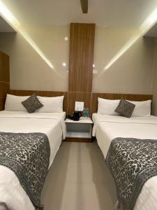 Postel nebo postele na pokoji v ubytování Hotel Sivas Regency