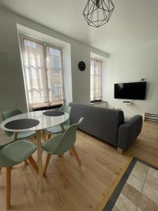 Μια τηλεόραση ή/και κέντρο ψυχαγωγίας στο Appartement Le Petit Charcot