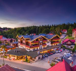 an aerial view of a large building in a town at Hotel Kryształ Conference & Spa in Szklarska Poręba