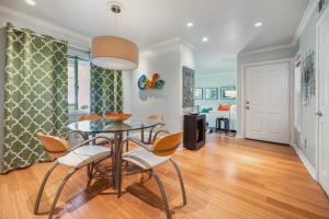 a dining room with a table and chairs at Monarch Beach - Gated Community - 1 Bed King in Dana Point