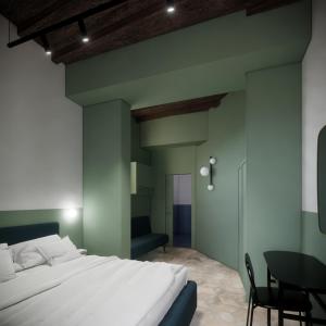 ローマにあるUnoUnOttoのベッドルーム(大きな白いベッド1台、テーブル付)