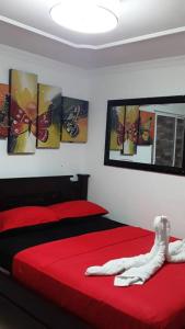 Lova arba lovos apgyvendinimo įstaigoje Posada Amiel Forbes Apartament 204