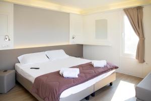 hu Venezia Camping in Town客房内的一张或多张床位
