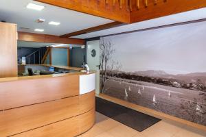 an office with a large window with a view at Hotel Bedoya in Santander