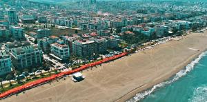 an aerial view of a beach and a city at Ramada Plaza by Wyndham Samsun in Samsun