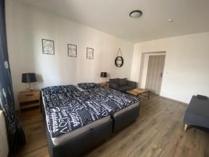 Postel nebo postele na pokoji v ubytování Černá Růže - Apartmán 4