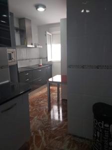 Η κουζίνα ή μικρή κουζίνα στο EL NIDO +3 φωτογραφίες