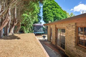 a house with a gazebo in a yard with trees at Juliana's Cottage 4 Bedroom Katoomba Home in Katoomba