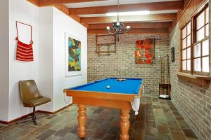 a room with a pool table and a chair at Juliana's Cottage 4 Bedroom Katoomba Home in Katoomba