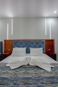 Lova arba lovos apgyvendinimo įstaigoje Hotel Divo Palace