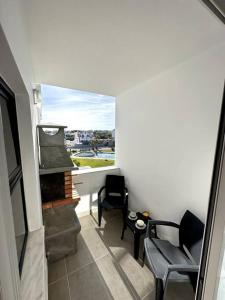Χώρος καθιστικού στο New Flat surround by beaches. +12 φωτογραφίες