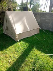 a tent sitting on the grass in a yard at SOFA CAMP NAIVASHA in Naivasha