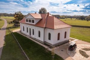 an aerial view of a white house with a roof at Zámeček - Chateau Lány in Břeclav