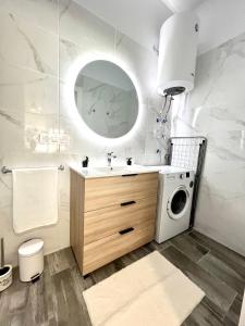 Ένα μπάνιο στο Estudio Jacaranda Marina