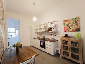 A kitchen or kitchenette at La tua casa a Piazza del Popolo