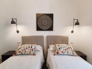 A bed or beds in a room at La tua casa a Piazza del Popolo