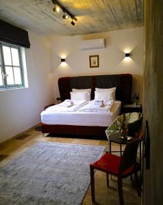 Katil atau katil-katil dalam bilik di Cittadella Suite