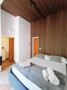 A bed or beds in a room at Mini Studio con Balcone a Piazza del Popolo