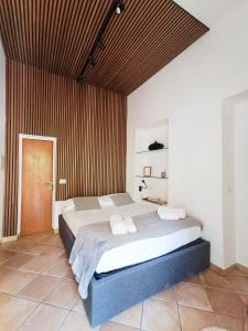 A bed or beds in a room at Mini Studio con Balcone a Piazza del Popolo