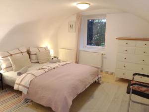 Postel nebo postele na pokoji v ubytování Apartment mit 1 Schlafzimmer in Altstadthaus