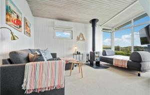 A seating area at Beautiful Home In Aabenraa With Wifi