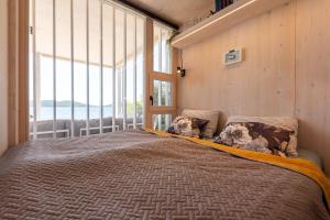 Giường trong phòng chung tại BUQEZ VILLAS - VILLA 78
