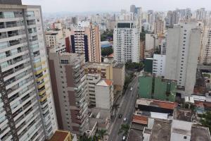 a view of a city with tall buildings at Sweet Home - Vivare Augusta in Sao Paulo