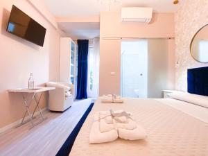 Postel nebo postele na pokoji v ubytování Casa Rosmini rooms, Dolomia best home