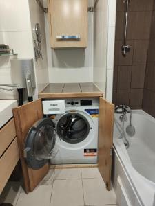 Η κουζίνα ή μικρή κουζίνα στο Eperon B3 appartement 21