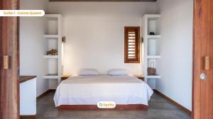 a bedroom with a bed and white walls at Casa Mutana Fortim Frente Mar Kiteplace de Luxo in Maceio +28 photos