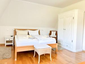 Postel nebo postele na pokoji v ubytování Haus Pamir App 16