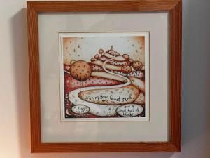 a framed picture of a painting of mushrooms at Moonloft@VillaSolbacka in Inkoo