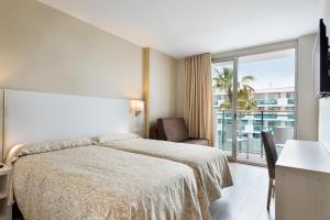 Postel nebo postele na pokoji v ubytování Hotel Best Maritim