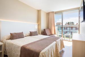 Postel nebo postele na pokoji v ubytování Hotel Best Maritim