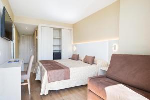 Postel nebo postele na pokoji v ubytování Hotel Best Maritim