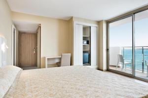 Postel nebo postele na pokoji v ubytování Hotel Best Maritim