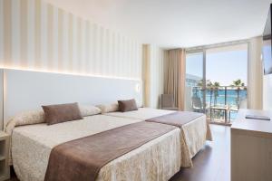 Postel nebo postele na pokoji v ubytování Hotel Best Maritim
