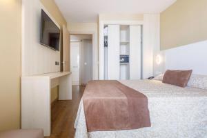 Postel nebo postele na pokoji v ubytování Hotel Best Maritim