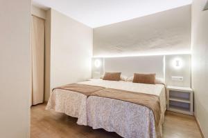 Postel nebo postele na pokoji v ubytování Hotel Best Maritim